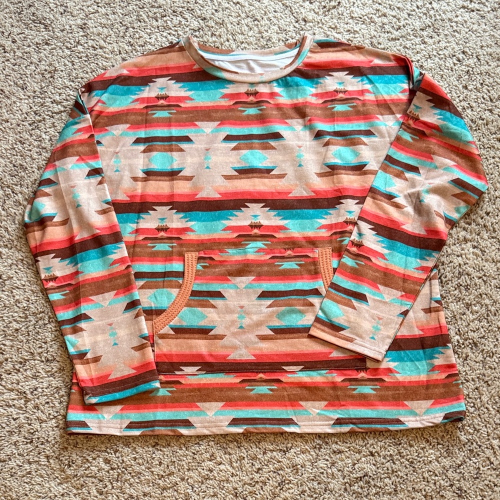 Boutique purchased Aztec long sleeve t-shirt. Size XL